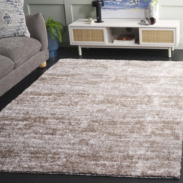 Safavieh Penelope Luxurious Shag Area Rug - Soft, Durable, And Elegant Design For Cozy Living Spaces Taupe ,Ivory 73% Polyester,27% Jute Pnl520e-4
