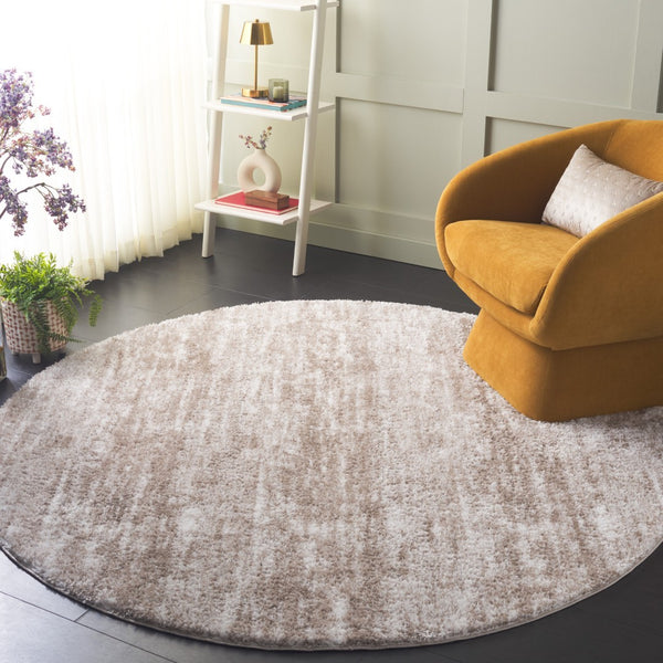 Safavieh Penelope Shag Area Rug: Luxurious Taupe & Ivory Design For Cozy Living Spaces And Ultimate Comfort Taupe ,Ivory 73% Polyester,27% Jute Pnl520e-6