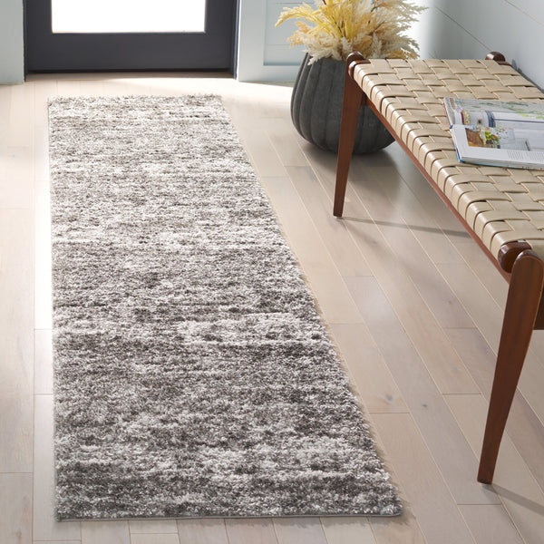 Safavieh Penelope Luxurious Shag Area Rug - Soft, Durable, And Elegant Design For Cozy Living Spaces Grey ,Ivory 73% Polyester,27% Jute Pnl520f-4