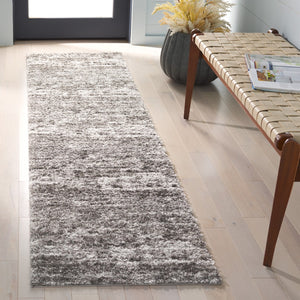 Safavieh Penelope Shag Area Rug: Luxurious Taupe & Ivory Design For Cozy Living Spaces And Ultimate Comfort Grey ,Ivory 73% Polyester,27% Jute Pnl520f-6