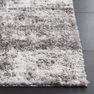 Safavieh Penelope Luxurious Shag Area Rug - Soft, Durable, And Elegant Design For Cozy Living Spaces Grey ,Ivory 73% Polyester,27% Jute Pnl520f-4
