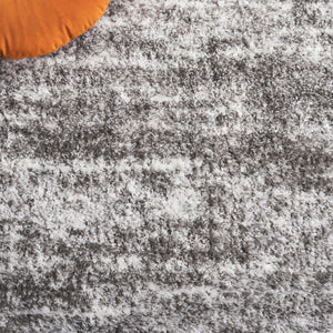 Safavieh Penelope Luxurious Shag Area Rug - Soft, Durable, And Elegant Design For Cozy Living Spaces Grey ,Ivory 73% Polyester,27% Jute Pnl520f-4