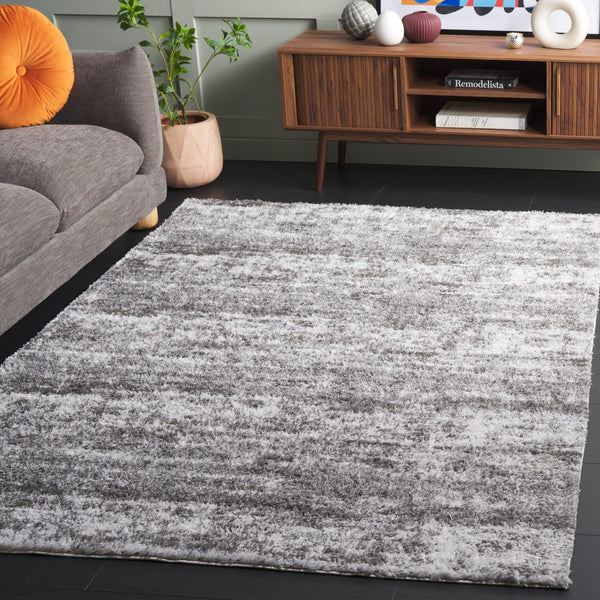 Safavieh Penelope Luxurious Shag Area Rug - Soft, Durable, And Elegant Design For Cozy Living Spaces Grey ,Ivory 73% Polyester,27% Jute Pnl520f-4