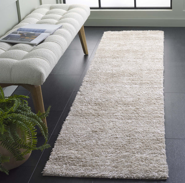 Safavieh Penelope Luxurious Shag Area Rug - Soft, Durable, And Elegant Design For Cozy Living Spaces Beige ,Ivory 73% Polyester,27% Jute Pnl520g-7r