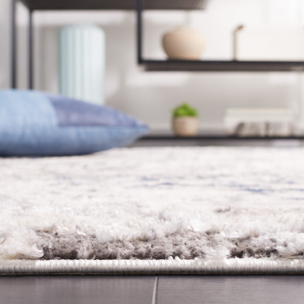 Safavieh Petra 102 Power Loomed Modern Rug Ivory / Blue PTA102A-9