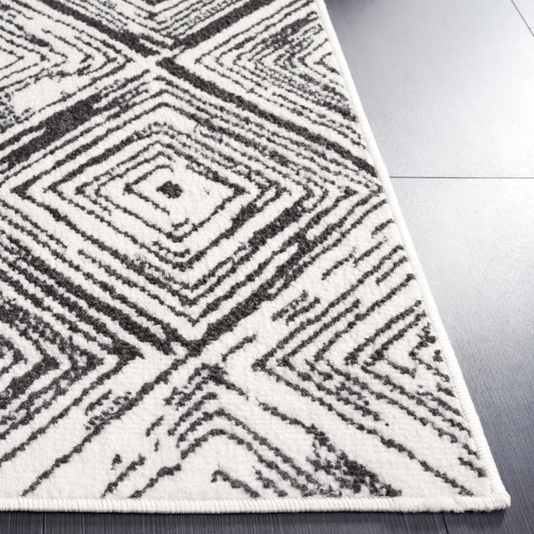 Safavieh Pyramid 225 Power Loomed 52% Polypropylene, 24% Jute, 13% Latex, 11% Polyester Modern Rug Ivory / Black PYR225A-9