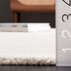 Safavieh Rodeo Drive 175 Hand tufted Modern Rug Ivory 5' x 8'