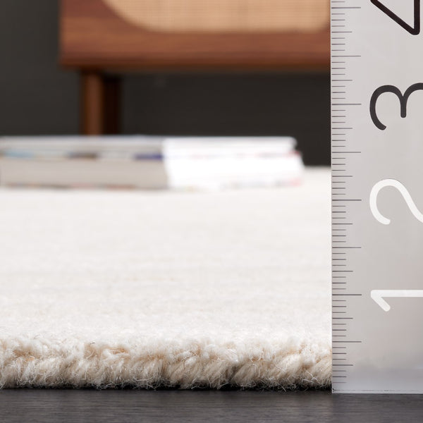 Safavieh Rodeo Drive 175 Hand tufted Modern Rug Ivory 5' x 8'