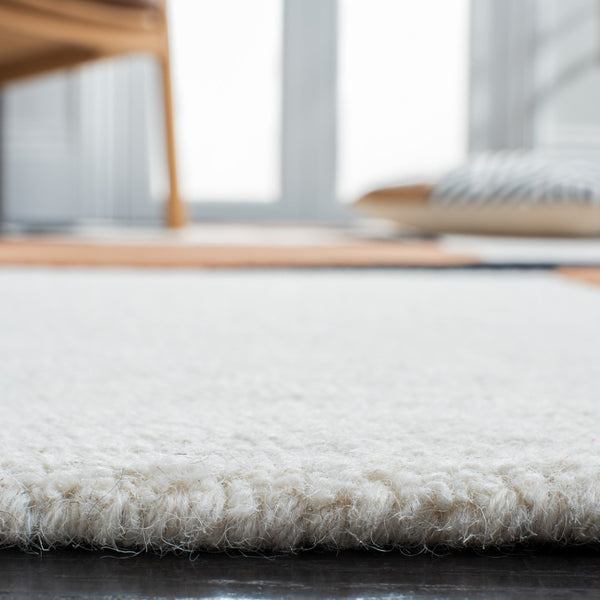 Safavieh Rodeo Drive 856 Hand Tufted Contemporary Rug IIX Ivory / Black RD856A-5