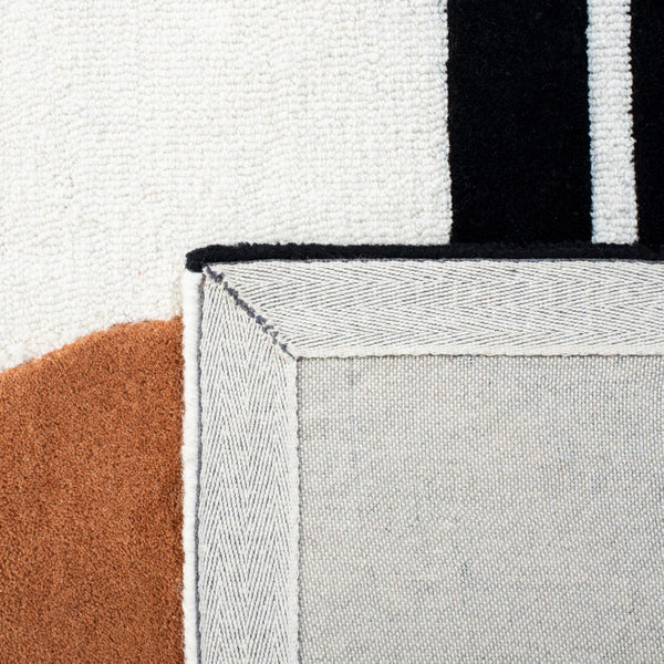 Safavieh Rodeo Drive 856 Hand Tufted Contemporary Rug IIX Ivory / Black RD856A-5