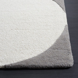 Rodeo Drive Hand Tufted Wool Cotton Rug - Luxurious Contemporary Design for Elegant Interiors