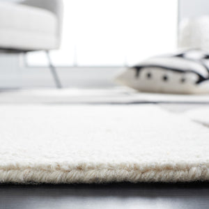 Rodeo Drive Hand Tufted Wool Cotton Rug - Luxurious Contemporary Design for Elegant Interiors