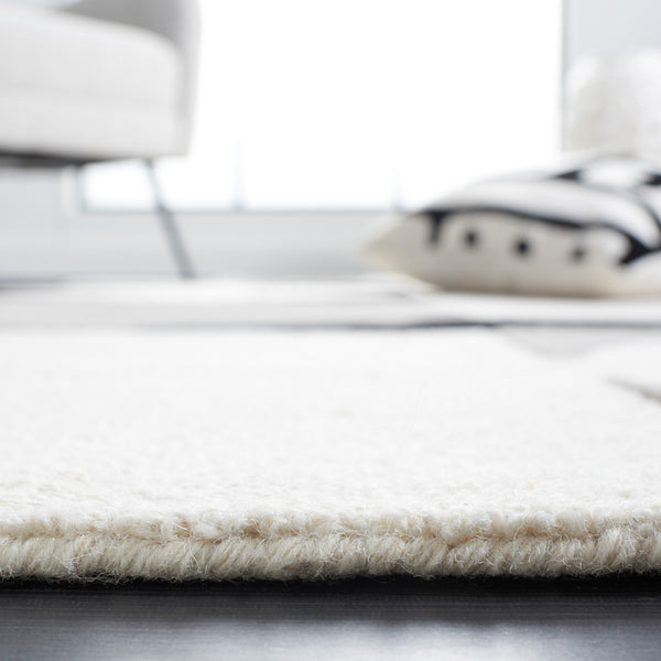 Rodeo Drive Hand Tufted Wool Cotton Rug - Luxurious Contemporary Design for Elegant Interiors