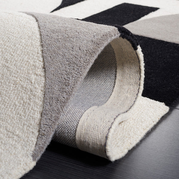 Rodeo Drive Hand Tufted Wool Cotton Rug - Luxurious Contemporary Design for Elegant Interiors