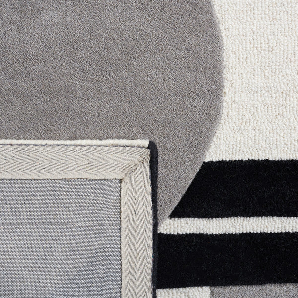 Rodeo Drive Hand Tufted Wool Cotton Rug - Luxurious Contemporary Design for Elegant Interiors