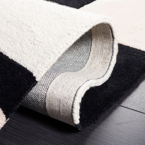 Rodeo Drive Hand Tufted Wool Cotton Rug - Luxurious Contemporary Design for Elegant Interiors