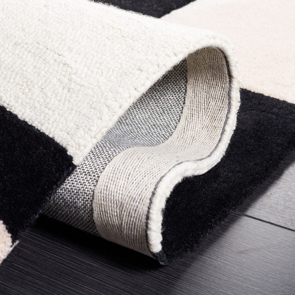 Rodeo Drive Hand Tufted Wool Cotton Rug - Luxurious Contemporary Design for Elegant Interiors