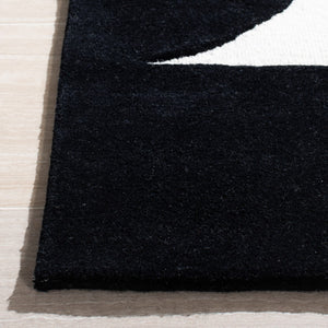 Safavieh Rodeo Drive 857 Hand Tufted Contemporary Rug IIX Ivory / Black RD857A-5