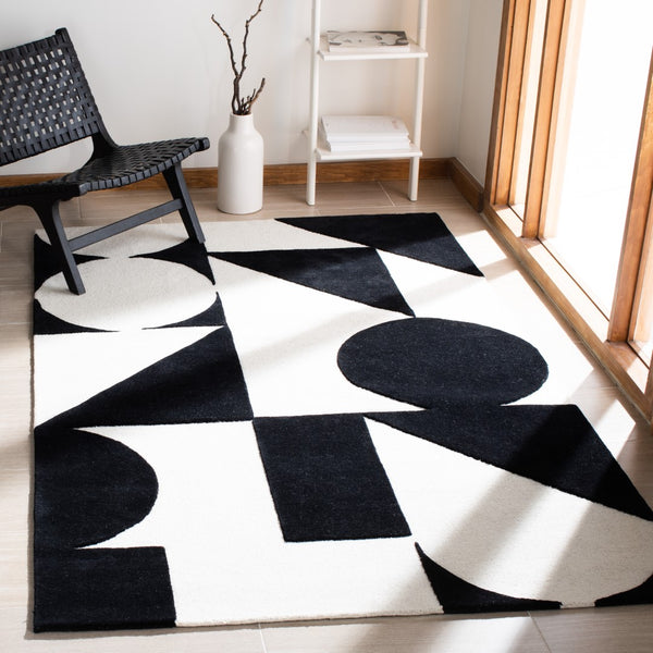 Safavieh Rodeo Drive 857 Hand Tufted Contemporary Rug IIX Ivory / Black RD857A-5