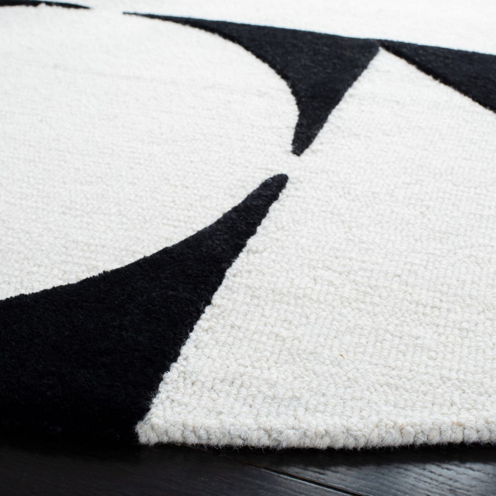 Safavieh Rodeo Drive 857 Hand Tufted Contemporary Rug Ivory / Black 6' x 6' Round