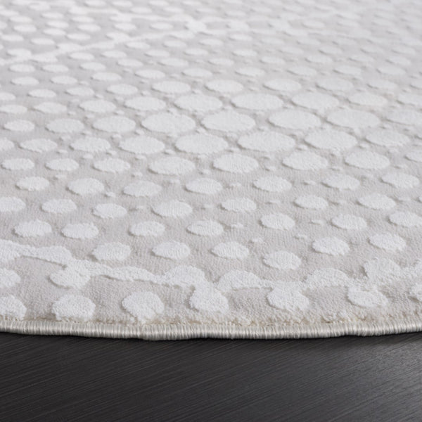 Safavieh Revive 108 Power Loomed Solid & Tonal Rug Ivory 6'-7" x 6'-7" Round