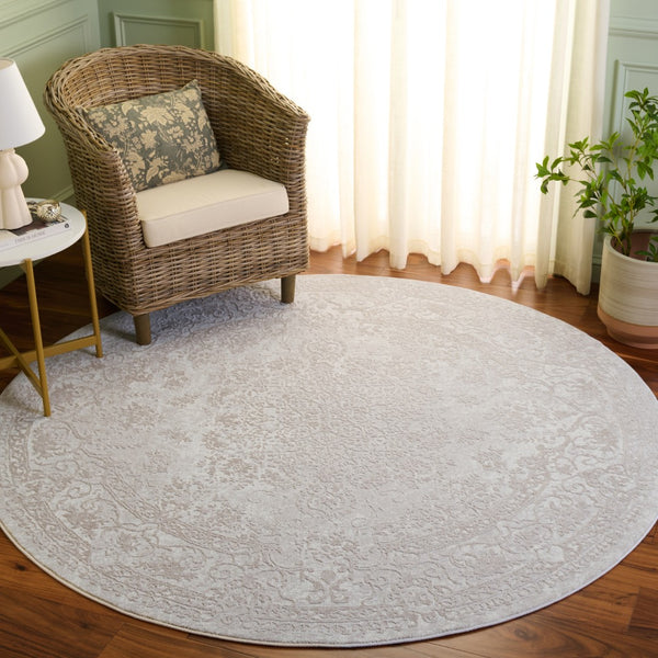 Safavieh Reflection Elegant Round Rug - Timeless Design, Soft Textures, And Classic Charm For Your Home Decor Creme ,Ivory 60% Polyester,40% Polypropylene Rft664d-12sq