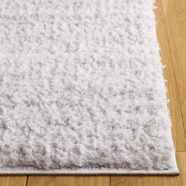 Safavieh Rumi Luxurious Round Shag Area Rug - Elegant Ivory Beige Design For Cozy Home Spaces 6ft 7in Light Grey ,Ivory Polyester Rms110f-28