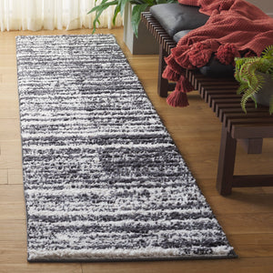 Safavieh Rumi Luxurious Round Shag Area Rug - Elegant Ivory Beige Design For Cozy Home Spaces 6ft 7in Charcoal ,Ivory Polyester Rms110h-9