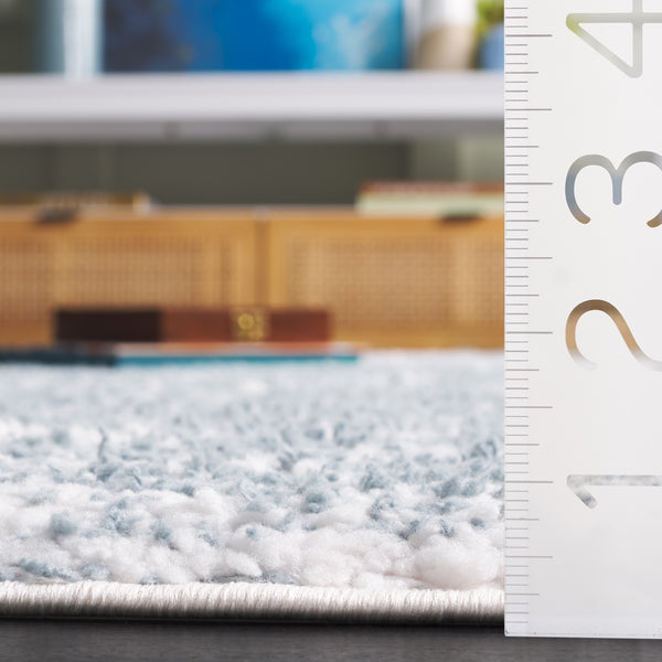 Safavieh Rumi Luxurious Round Shag Area Rug - Elegant Ivory Beige Design For Cozy Home Spaces 6ft 7in Light Blue ,Ivory Polyester Rms110l-6