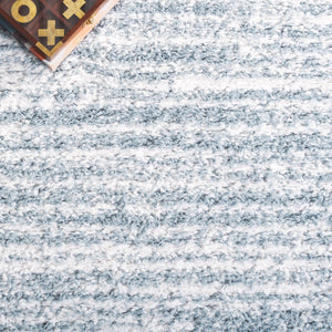 Safavieh Rumi Luxurious Round Shag Area Rug - Elegant Ivory Beige Design For Cozy Home Spaces 6ft 7in Light Blue ,Ivory Polyester Rms110l-6