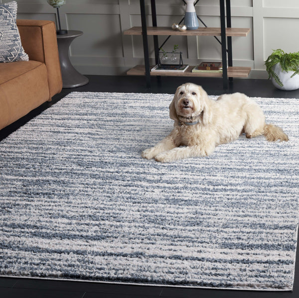 Safavieh Rumi Luxurious Round Shag Area Rug - Elegant Ivory Beige Design For Cozy Home Spaces 6ft 7in Light Blue ,Ivory Polyester Rms110l-6