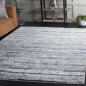 Safavieh Rumi Luxurious Round Shag Area Rug - Elegant Ivory Beige Design For Cozy Home Spaces 6ft 7in Light Blue ,Ivory Polyester Rms110l-6