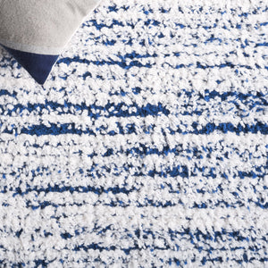 Safavieh Rumi Luxurious Round Shag Area Rug - Elegant Ivory Beige Design For Cozy Home Spaces 6ft 7in Navy ,Ivory Polyester Rms110n-7sq