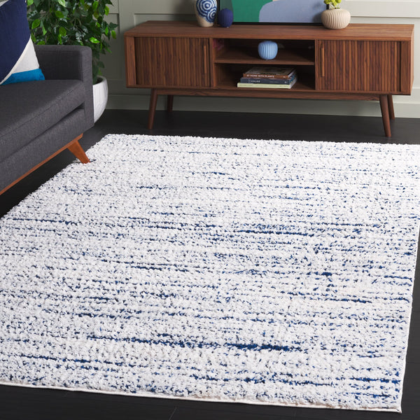 Safavieh Rumi Luxurious Round Shag Area Rug - Elegant Ivory Beige Design For Cozy Home Spaces 6ft 7in Navy ,Ivory Polyester Rms110n-7sq