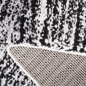 Safavieh Rumi Luxurious Round Shag Area Rug - Elegant Ivory Beige Design For Cozy Home Spaces 6ft 7in Black ,Ivory Polyester Rms110z-28