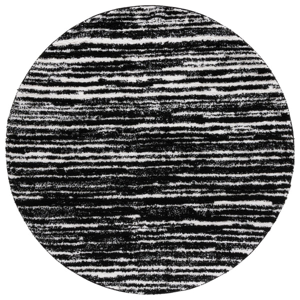 Safavieh Rumi Luxurious Round Shag Area Rug - Elegant Ivory Beige Design For Cozy Home Spaces 6ft 7in Black ,Ivory Polyester Rms110z-28