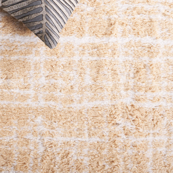 Safavieh Rumi Shag Area Rug - Luxurious Gold And Ivory Texture For Elegant Home Décor, Perfect For Any Space Gold ,Ivory Polyester Rms136d-28