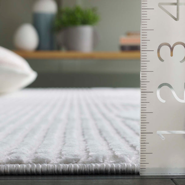 Safavieh Saylor Modern Area Rug - Luxurious Ivory Design With Plush Texture, Durable Craftsmanship & Style Ivory 70% Polypropylene,30% Polyester Shrink Say112a-6r