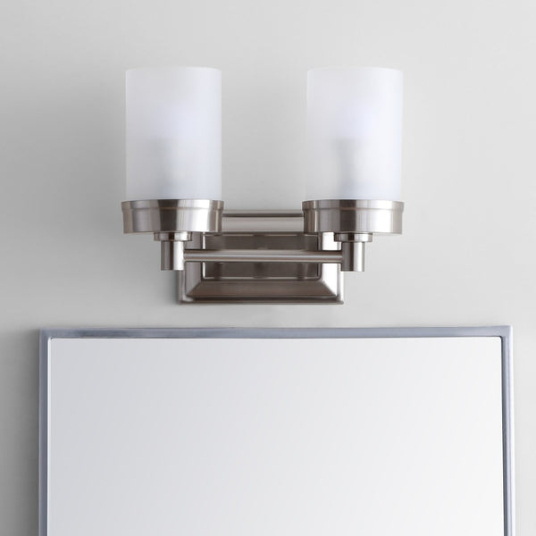 Safavieh KYLAN Two-Light Sconce in Bronze with White Frosted Glass Shades – Perfect for Elegant Lighting Solutions SCN4048A