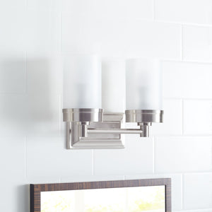 Safavieh KYLAN Two-Light Sconce in Bronze with White Frosted Glass Shades – Perfect for Elegant Lighting Solutions SCN4048A