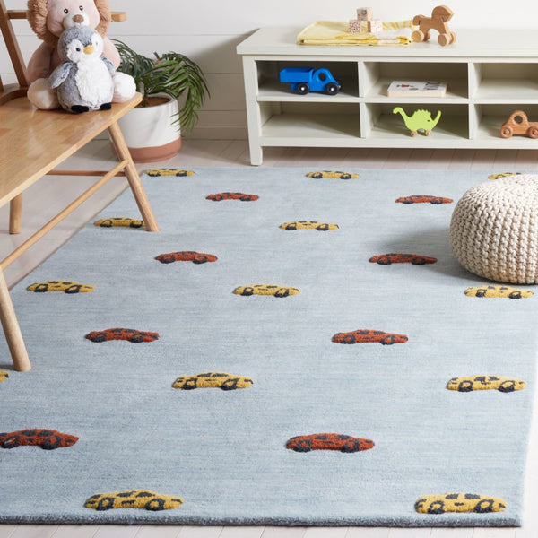 Safavieh Safavieh Kids 806 Hand Tufted Kids Rug Light Blue / Yellow 5' x 8'