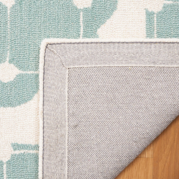 Safavieh Safavieh Kids 927 Hand Tufted Kids Rug Turquoise / Ivory SFK927K-8