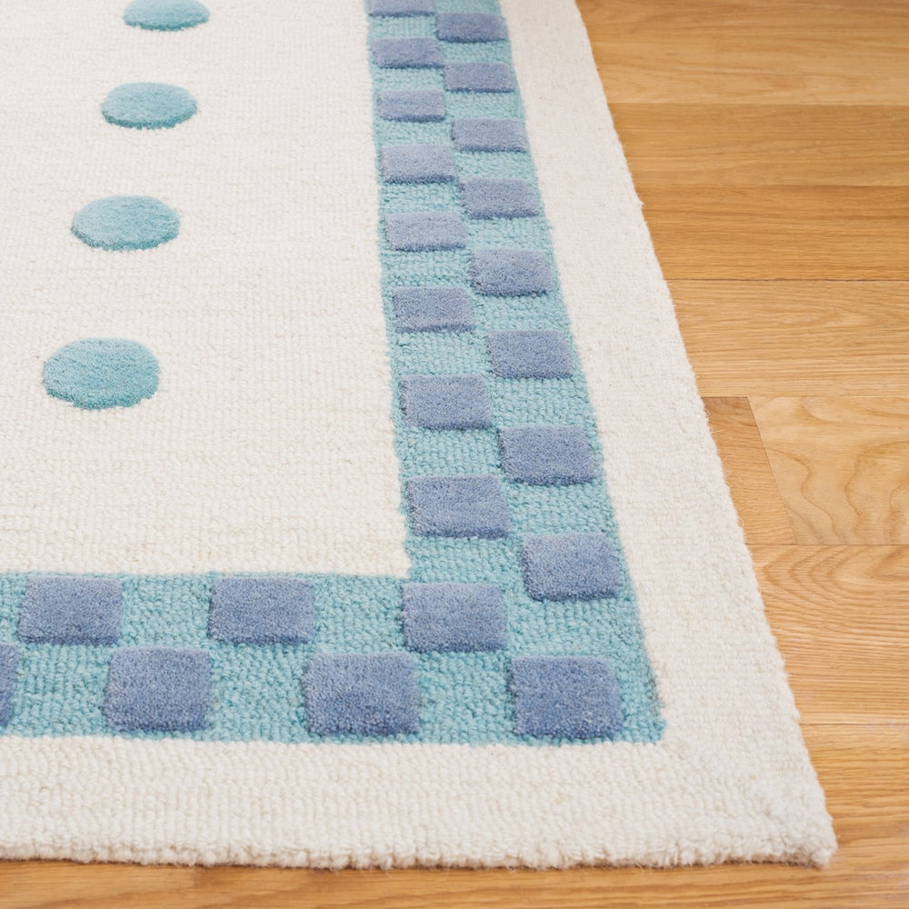 Safavieh Safavieh Kids 930 Hand Tufted Kids Rug Ivory / Blue SFK930M-8