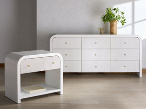 Liabella Curved 9-Drawer Dresser With Luxe Accents And Generous Storage For Glamorous Interiors