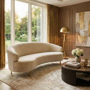 Primrose Curved Sofa With Plush Taupe Upholstery And Polished Metal Accents For Luxe Living Rooms