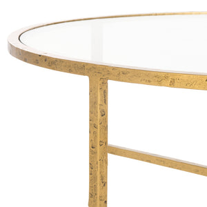 Safavieh TAURI Forged Metal Round Coffee Table - Industrial Elegance with Clear Glass Top for Modern Living Spaces Brass / Clear SFV9552A