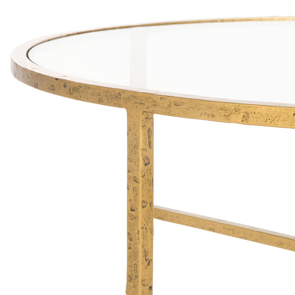 Safavieh TAURI Forged Metal Round Coffee Table - Industrial Elegance with Clear Glass Top for Modern Living Spaces Brass / Clear SFV9552A