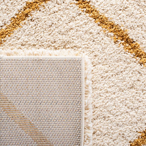Safavieh Hudson Shag 281 Power Loomed Shag Rug Ivory / Gold SGH281E-2
