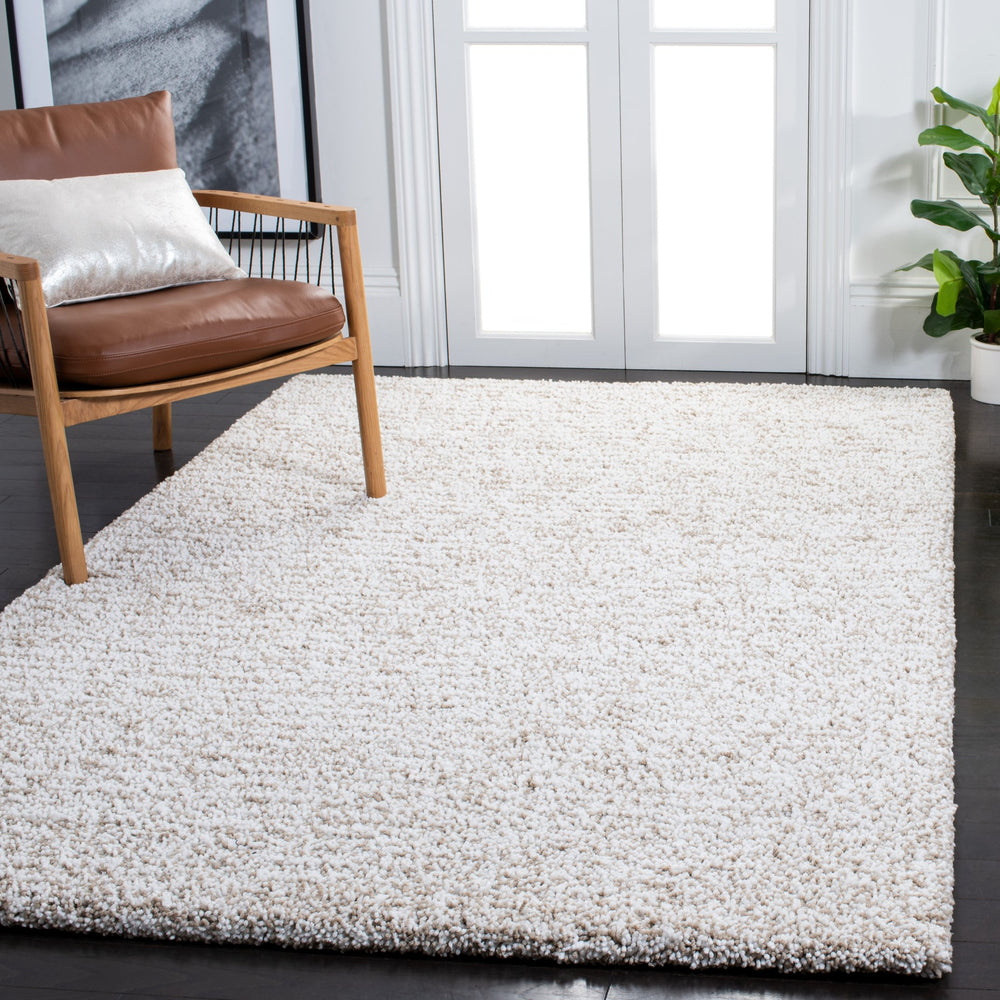 Safavieh Ultimate Sand & Ivory Shag Rug — Hand-Tufted Plush Polyester Pile For Cozy, Noise-Reducing Living Spaces 9'-0" x 12'-0" SGU211C-9