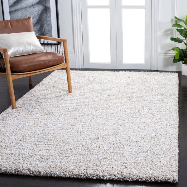 Safavieh Ultimate Sand & Ivory Shag Rug — Hand-Tufted Plush Polyester Pile For Cozy, Noise-Reducing Living Spaces 9'-0" x 12'-0" SGU211C-9